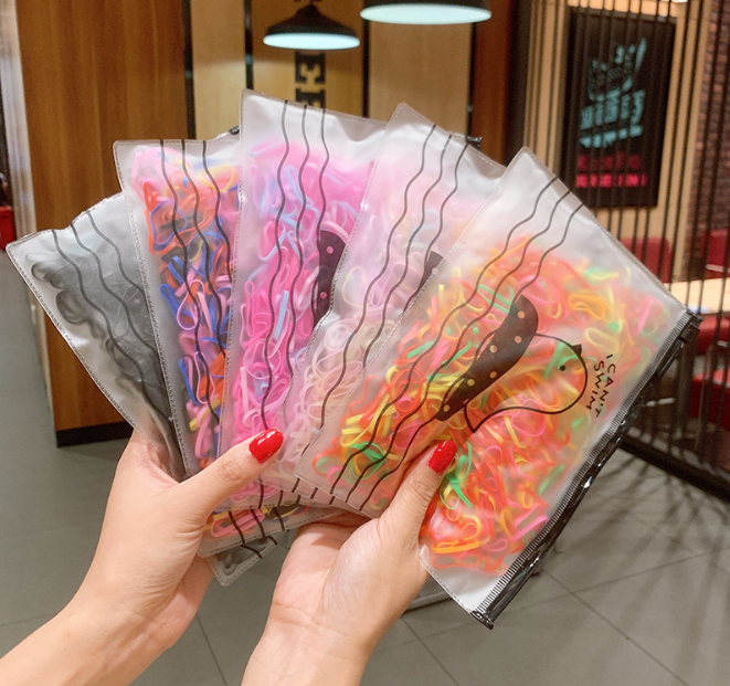 Set 100c chun buộc tóc tặng kèm túi zip VEMZKIDS