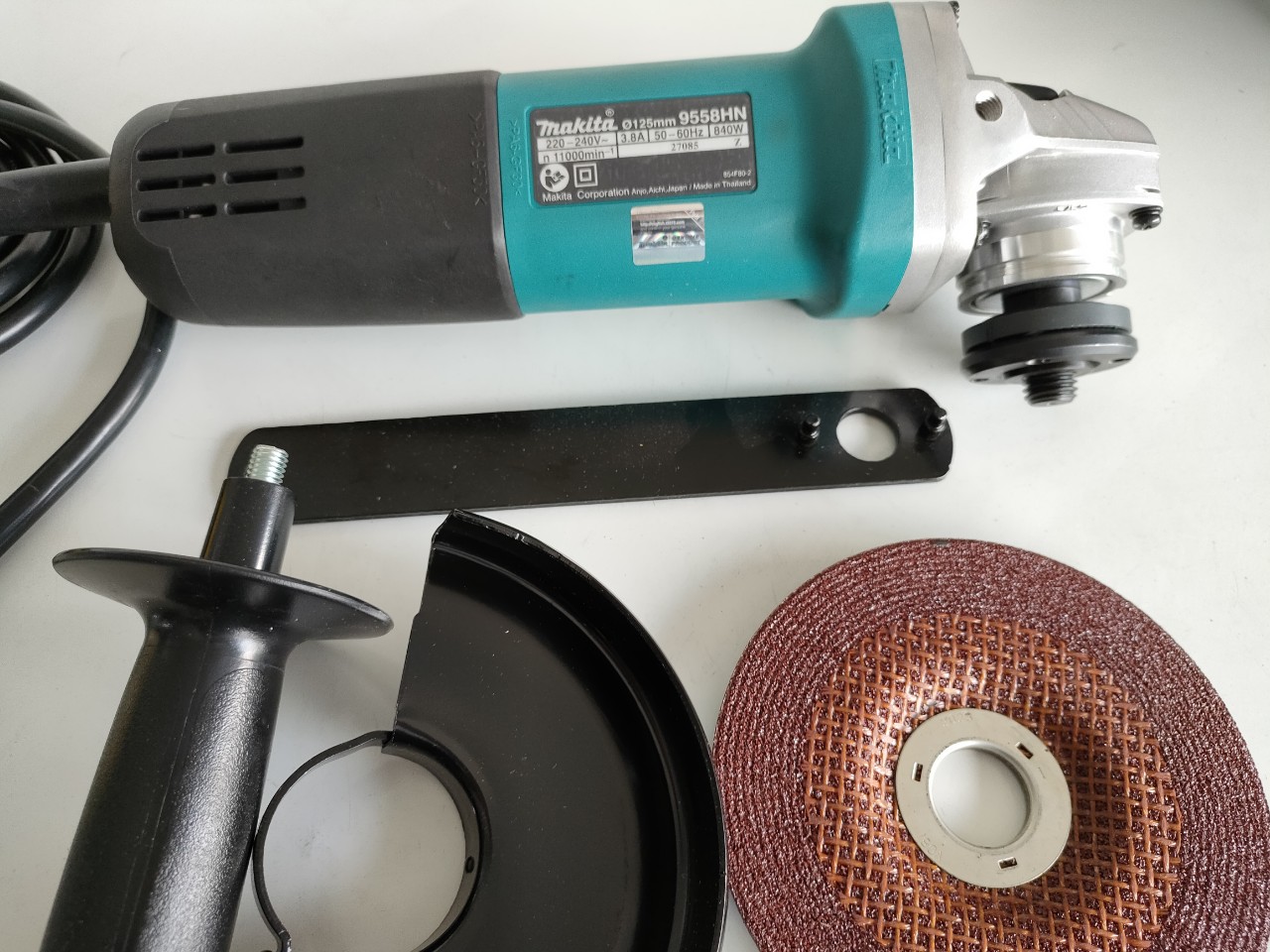 Máy mài góc công tắc trượt , đường kính đá 125mm - 840w makita 9558hn chính hãng