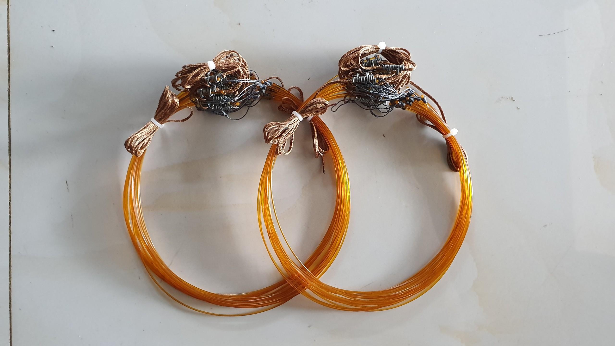 2 bộ thòng dây màu cỏ khô ( 2 bộ 40 vòng bẫy quốc , bịp đường kính 9cm ) bẫy gà cước thái, dù siêu bền, khoen đồng hàng thái lan ( 2 bộ 40 vòng dài 4m )
