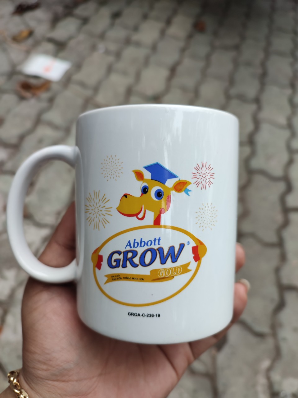 Ly sứ Grow cao cấp có quai hàng kM của Abott Growth