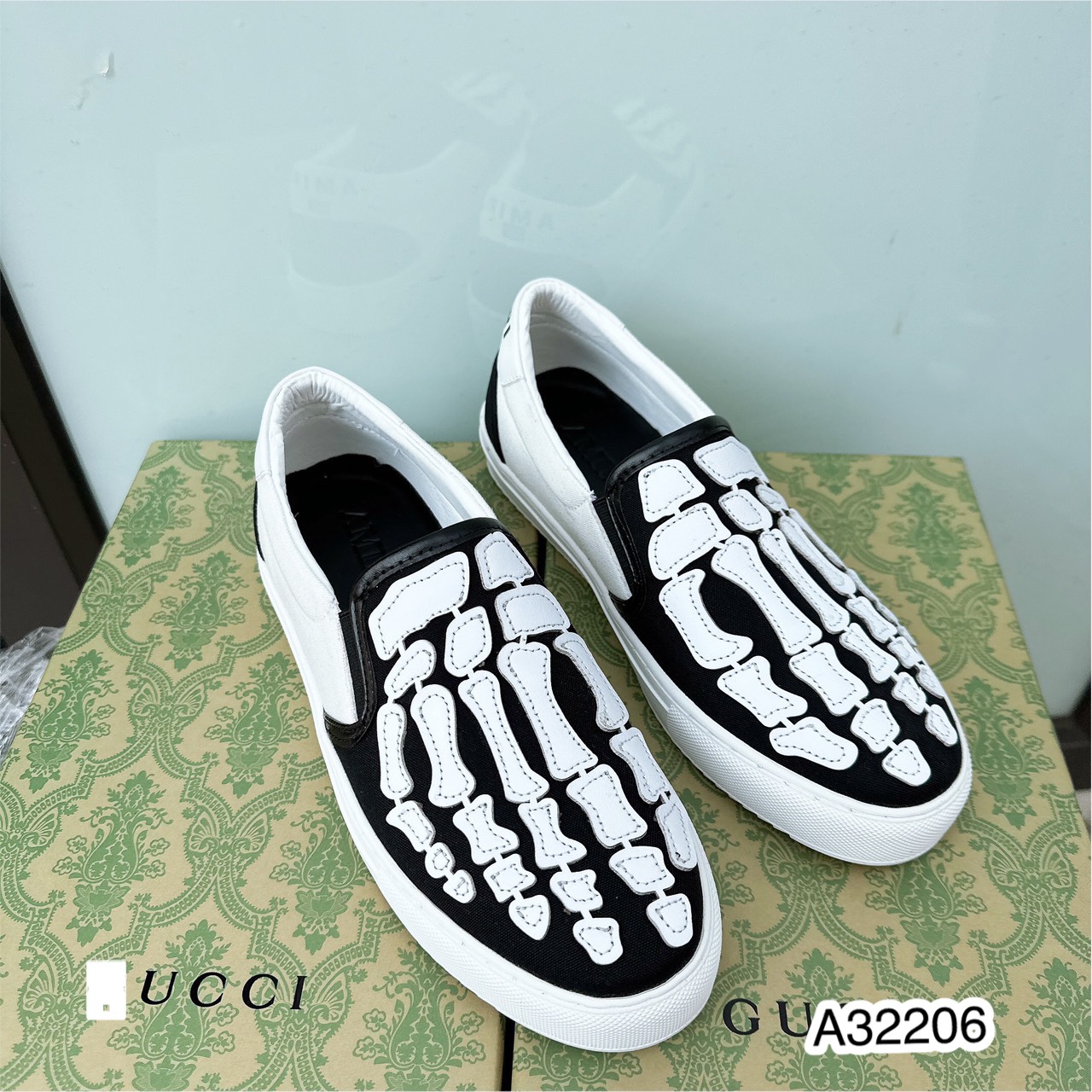 Giày lười nam AMR thêu hình xương trắng đen - Giày slipon hàng đẹp