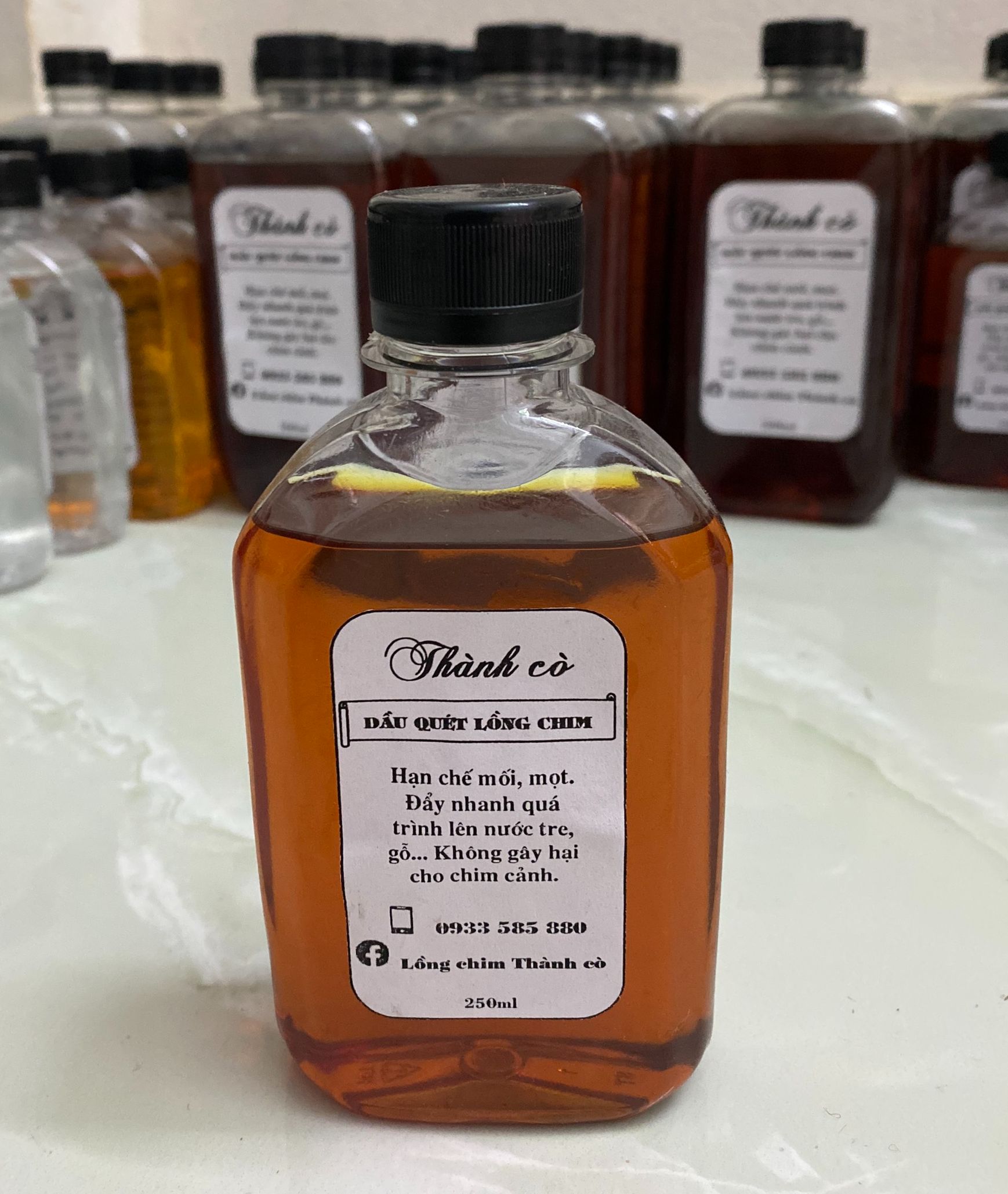 Dầu quét lồng chim Thành cò chai 500ml