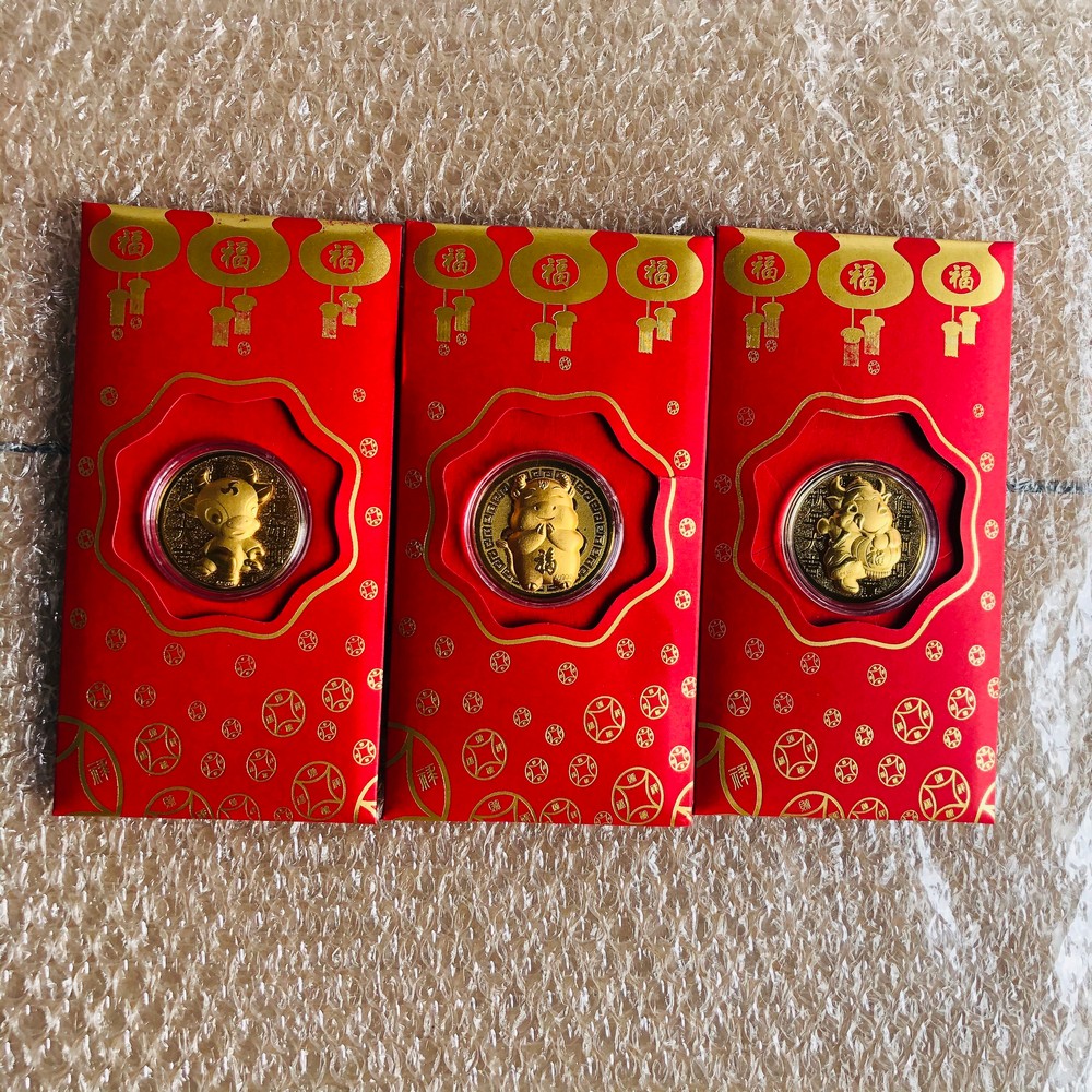 Một bao lì xì tết hình con trâu mạ vàng 24k may mắn - lì xì trâu vàng