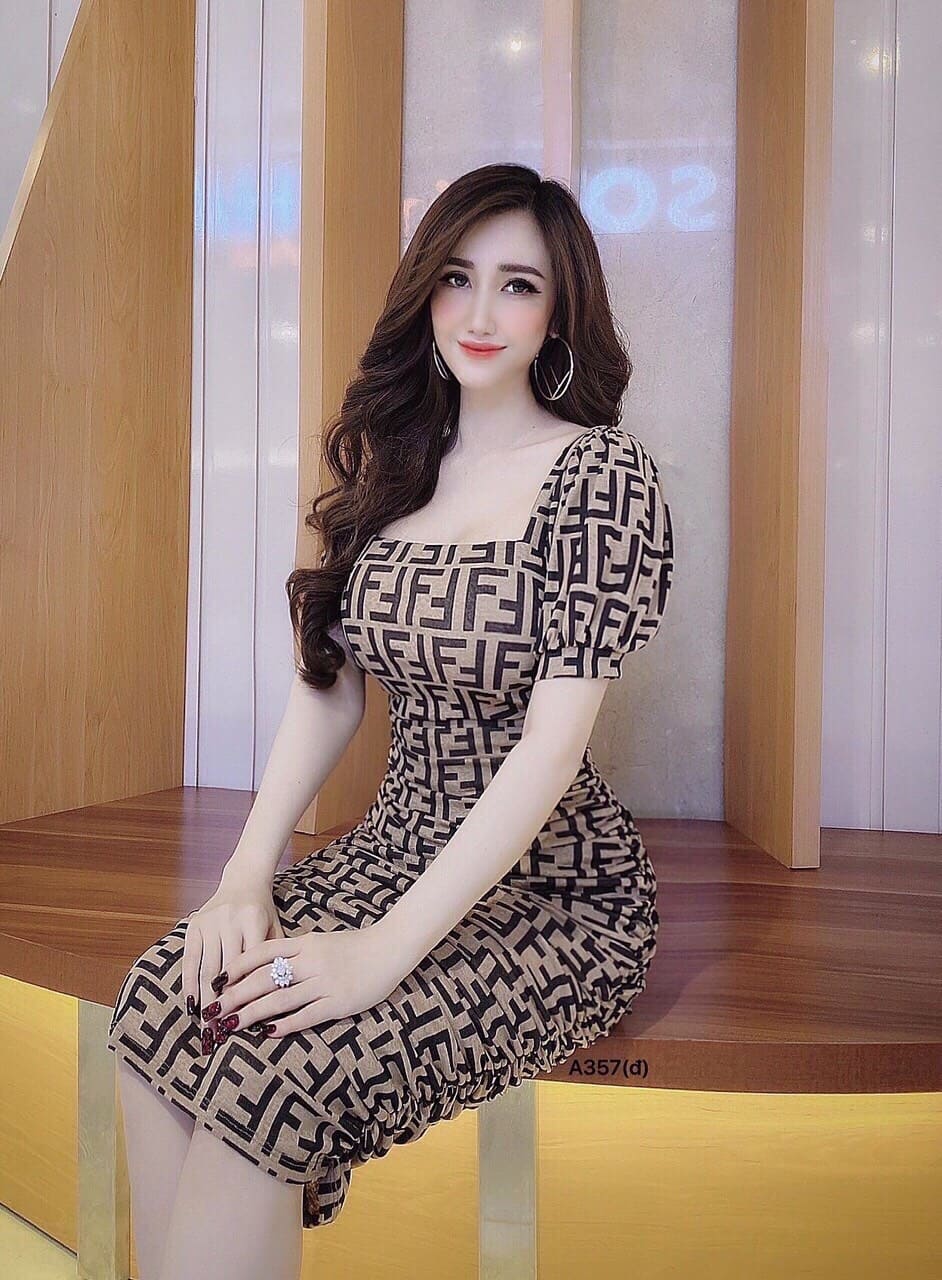 Đầm body tay phồng họa tiết hình khối sang chảnh