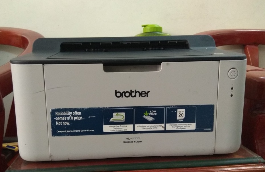 Máy in văn phòng ( in 1 mặt a4 nhỏ gọn ) - brother 1111 ( tặng hộp mực không mực thải - dây nguồn , cáp in mới 100% đi theo máy )