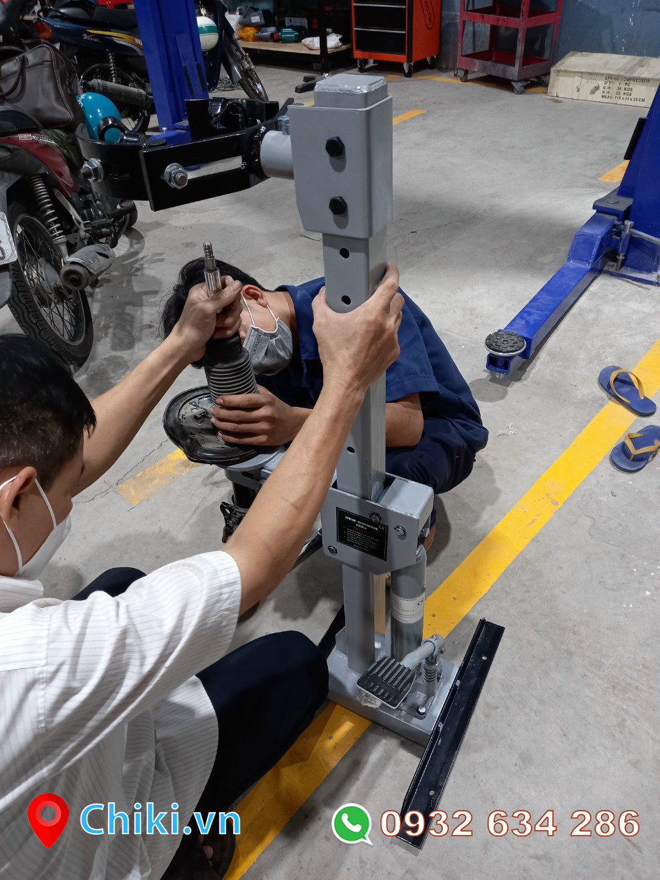 Máy ép lò xo phuộc nhún xe hơi