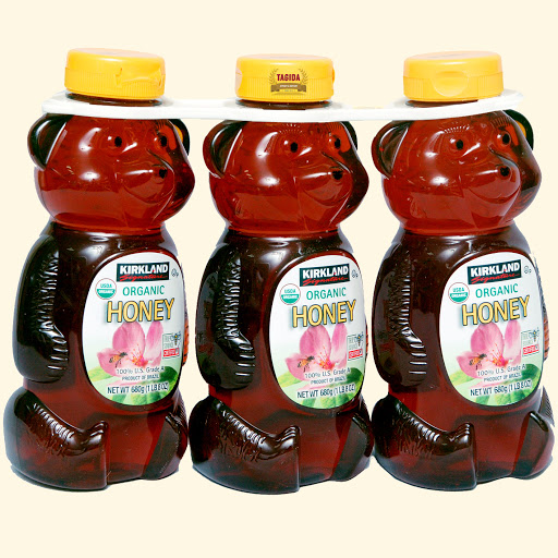 Mật ong kirkland organic raw honey 680g
