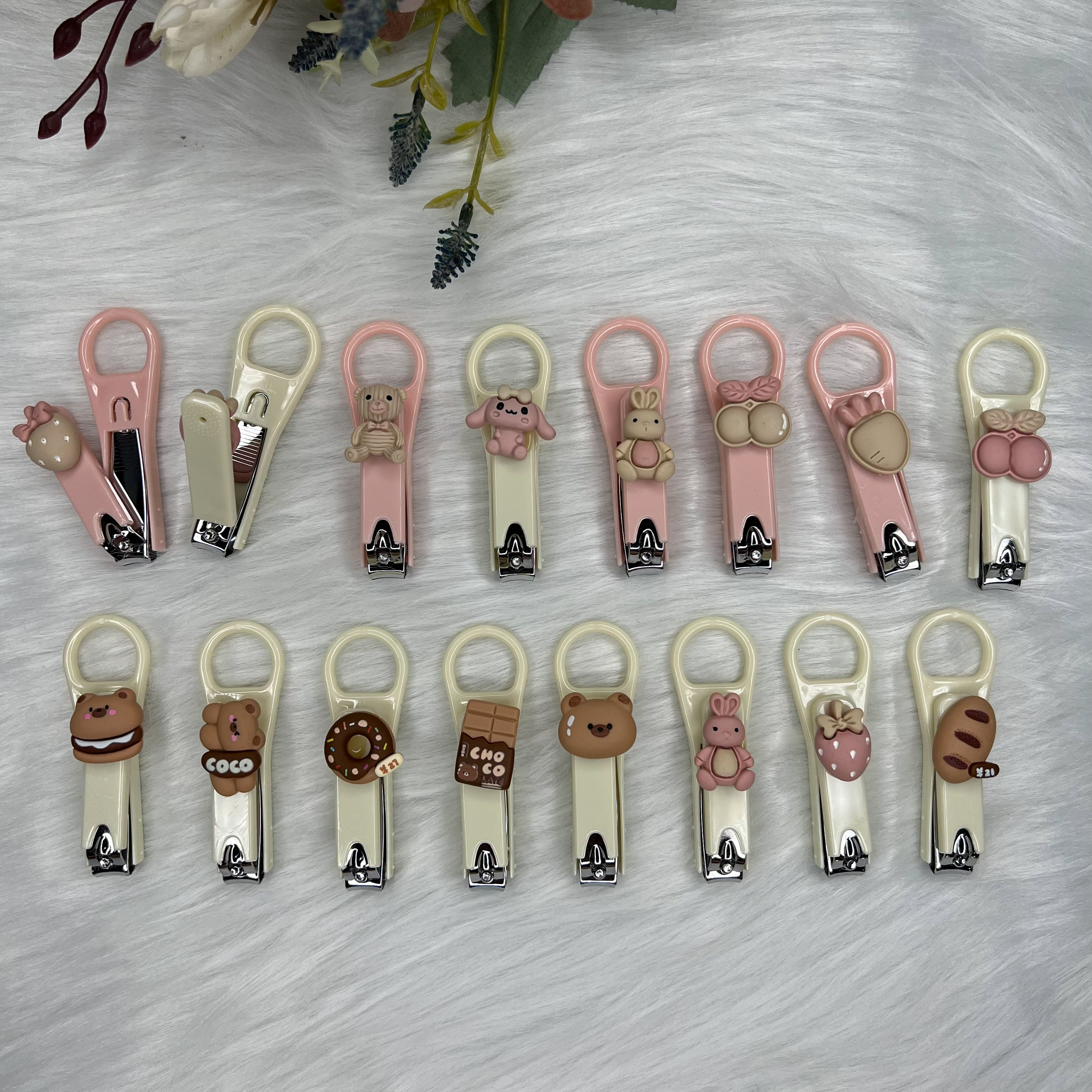 Bấm móng tay hình thú cute được chọn mẫu