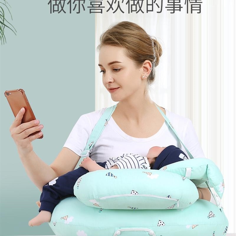 Newborn baby holding support for breastfeeding artifact breastfeeding