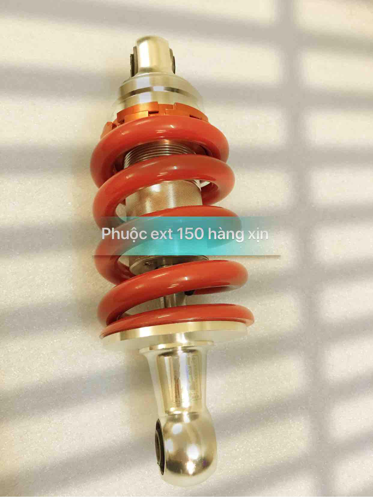 Phuộc sau ext 150 màu đỏ
