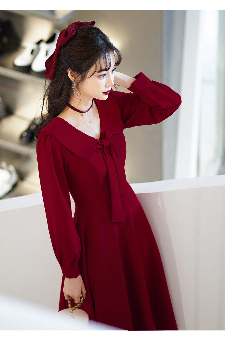 Đầm đự tiệc dáng xoè tay dài phối nơ cổ