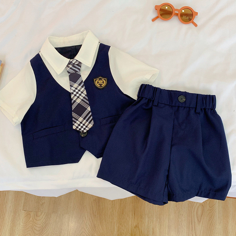 Bộ vest bé trai Hàn Quốc Magickids set vest 3 chi tiết gồm áo gile, áo sơ mi trắng cà vạt, quần short BR22034