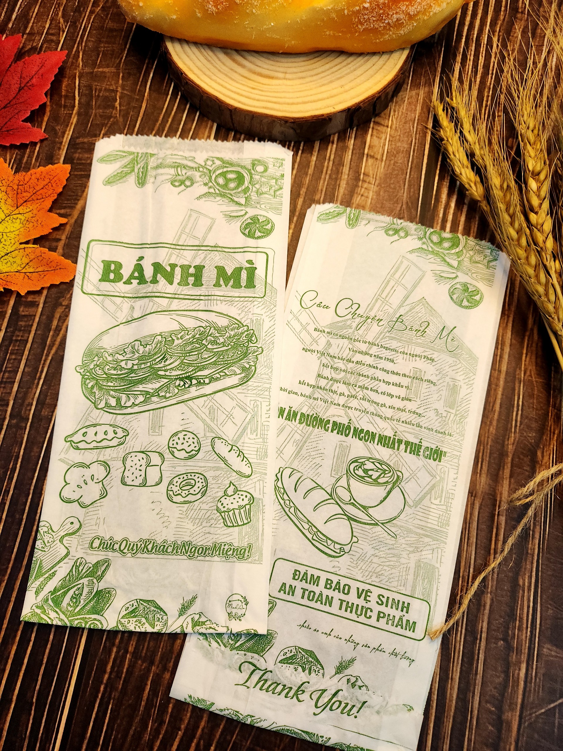 100 TÚI GIẤY ĐỰNG BÁNH MÌ TRUYỀN THỐNG HỌA TIẾT XANH (M.AN XANH). NHẬN IN THƯƠNG HIỆU RIÊNG CHỈ TỪ 500 TÚI.