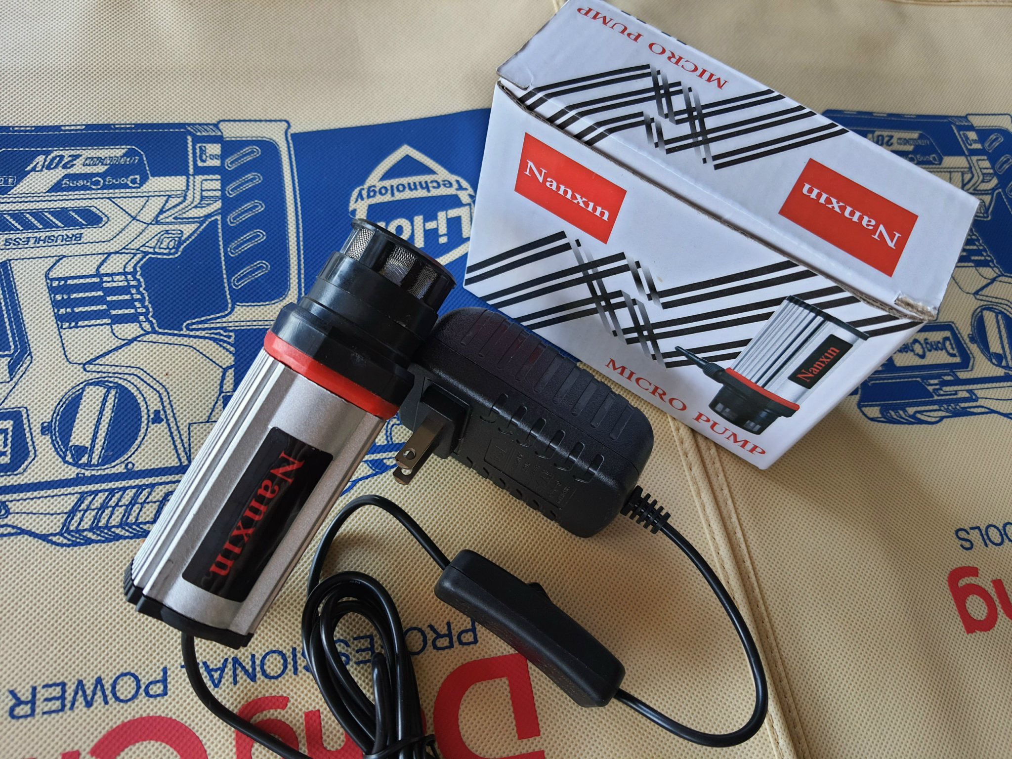 Máy bơm mini máy cắt gạch, máy cắt tường 5 rãnh Nanxi ( Lực đẩy 15M)