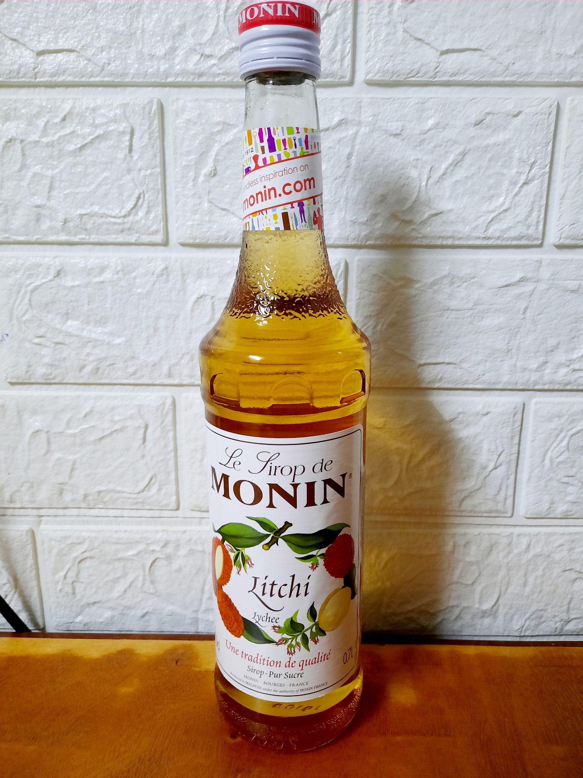 Siro Monin Vải chai 700ml