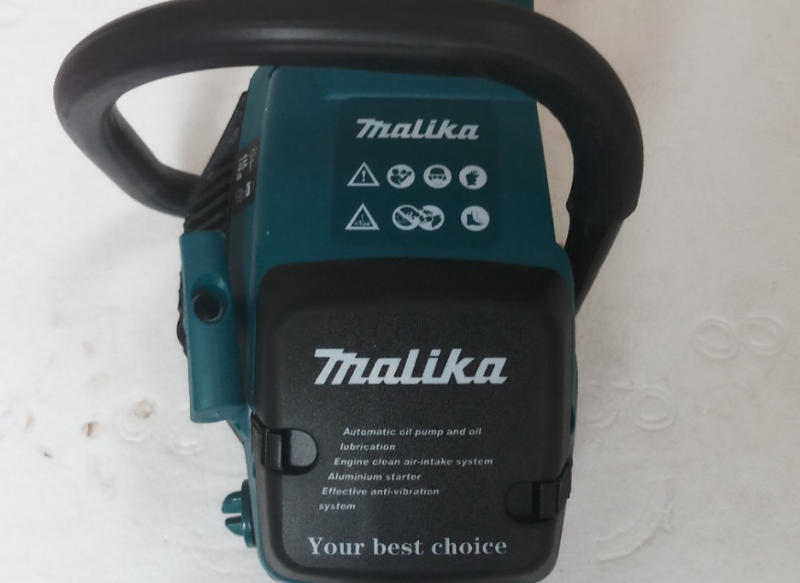 Máy cưa xích chạy xăng malika 58cc