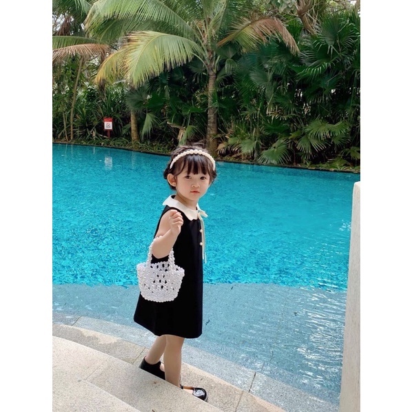 Váy bèo đen cúc ngọc cho bé gái