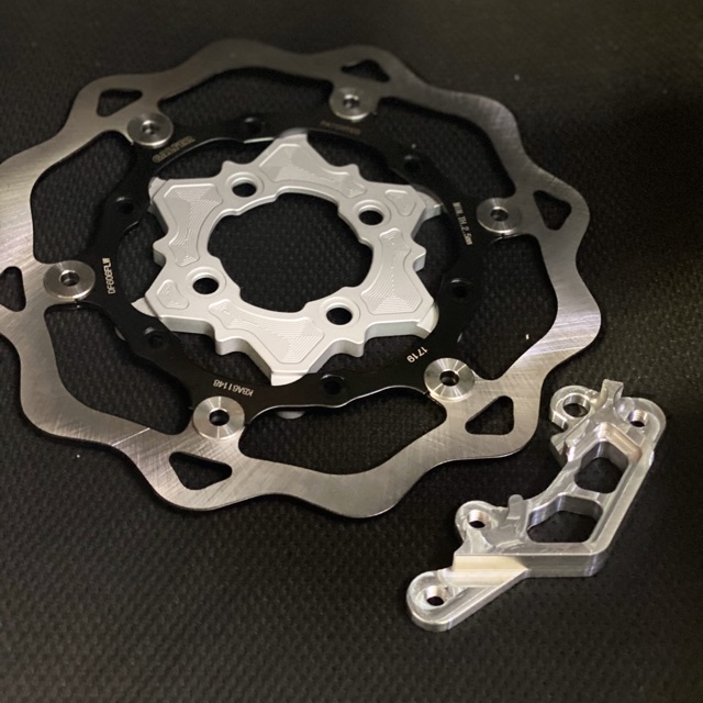 Dĩa thắng KTM 260 mm  tặng kèm 1 miếng đệm nhôm cnc  ( brake disc + pads) dùng cho phuộc trước zin heo thắng zin