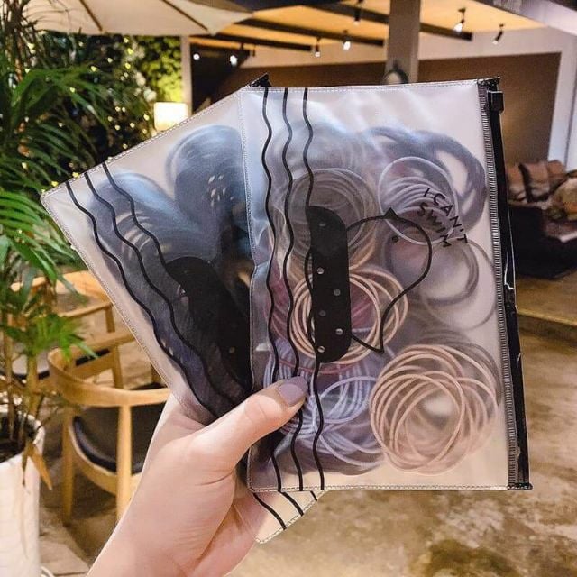 Set 100 sợi thun cột tóc kèm túi zip, co giãn tốt. Màu sắc hiện đại cho nàng thêm xinh