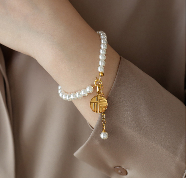 Lắc Tay Ngọc Trai Titan Ko Đen TT 3530