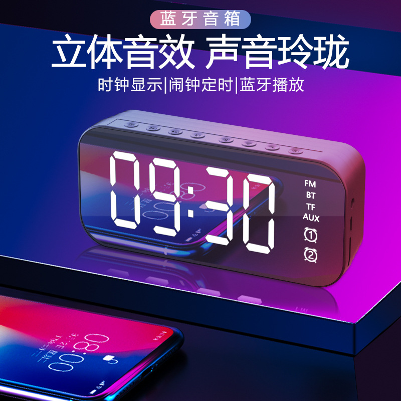 Loa bluetooth mini tráng gương kèm đồng hồ báo thức .