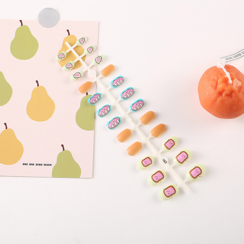 Móng tay giả ngắn cute - Gồm 24 móng tay giả + Tặng 1 chai keo dán móng 2g như hình + Tặng 1 cây dũa móng như hình