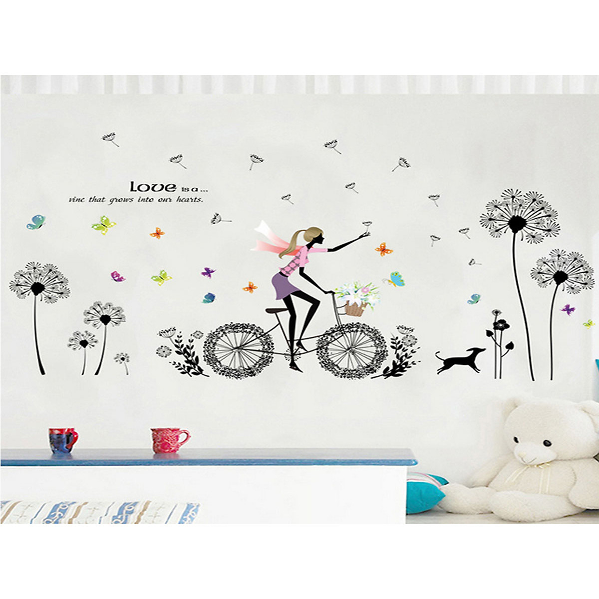 Decal dán tường cô gái đạp xe hoa bồ công anh đen xl8212