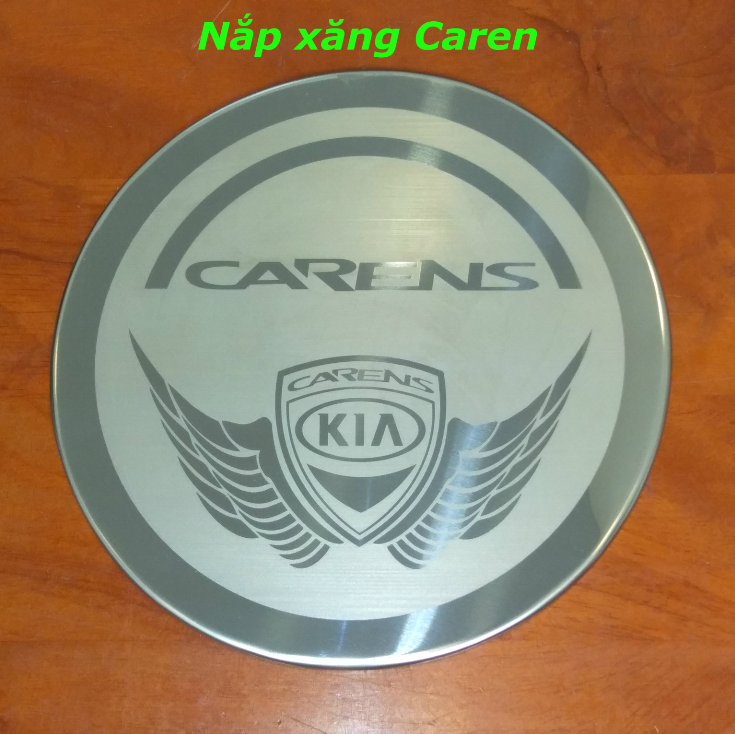 Ốp inox nắp bình xăng kia caren