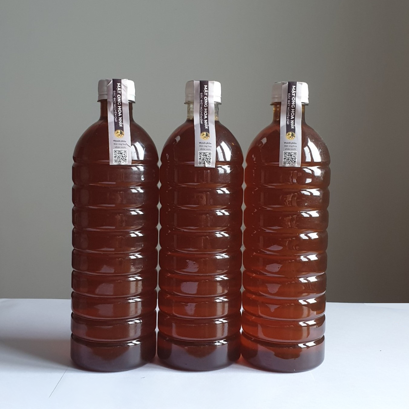 Mật ong rừng hoa nhãn 1 lít nguyên chất 100% chuẩn - thế hồng honey