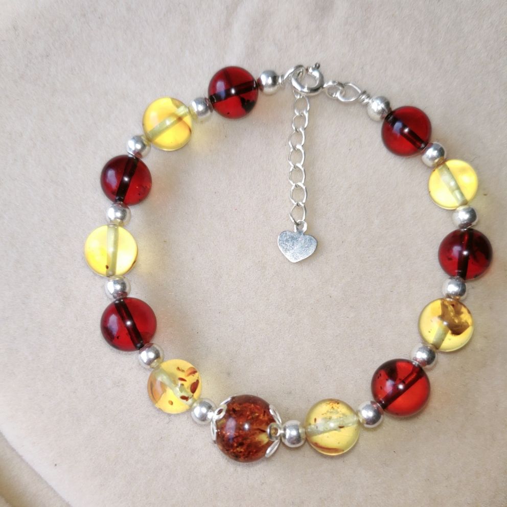 vòng hổ phách charm bạc cho bé từ 5-12 tuổi