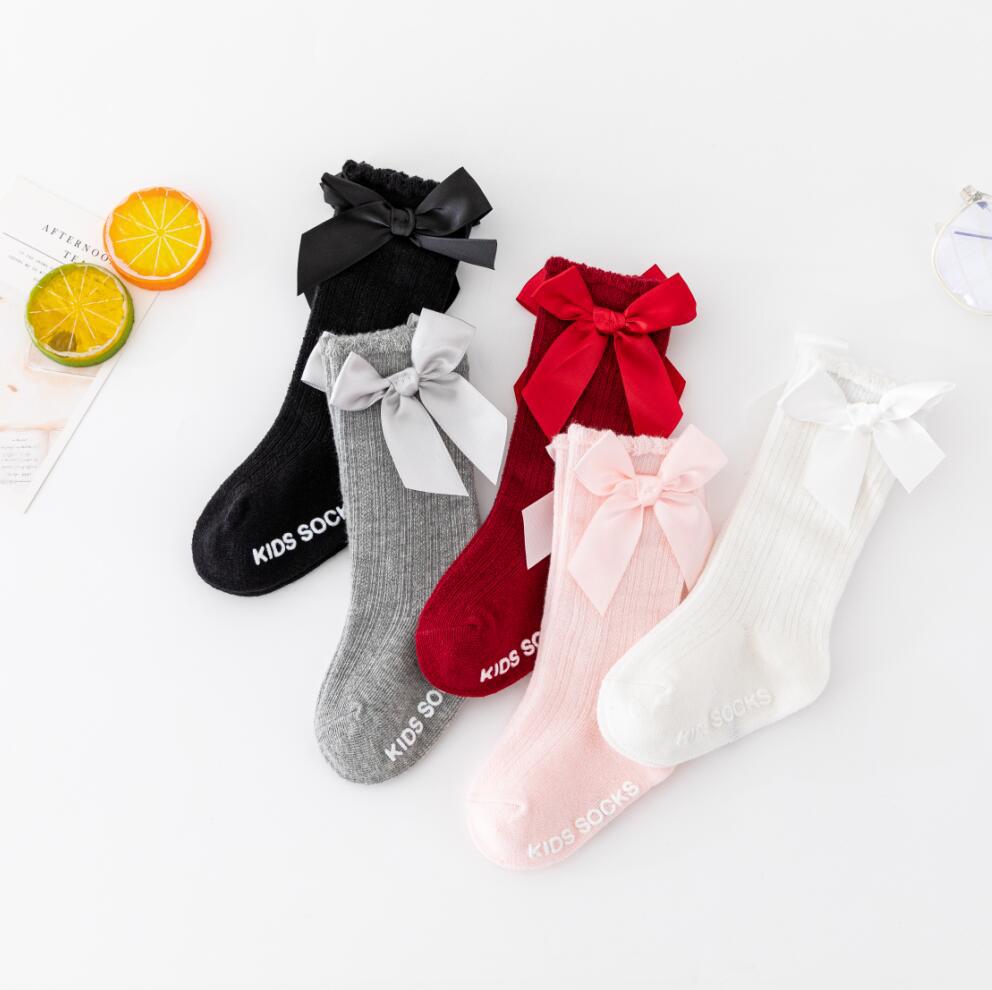 Tất vớ cổ cao cho bé gái 0 đến 3 tuổi chống trơn trượt đính nơ cotton