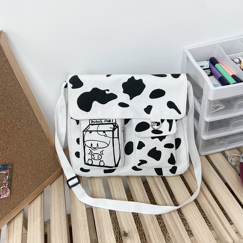 Túi đeo chéo vải bò sữa nắp