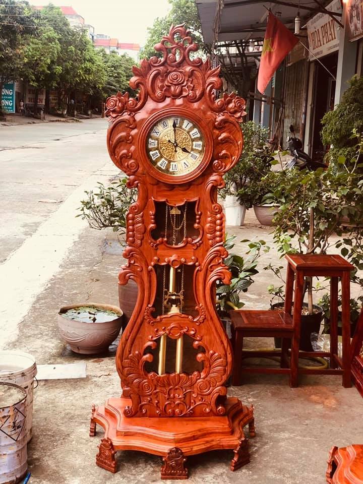 Đồng hồ cây đàn gỗ hương đá kích thước cao 175 cm rộng 72 cm sâu 43 cm, máy sunnuy hàn quốc cảm ứng ánh sáng.