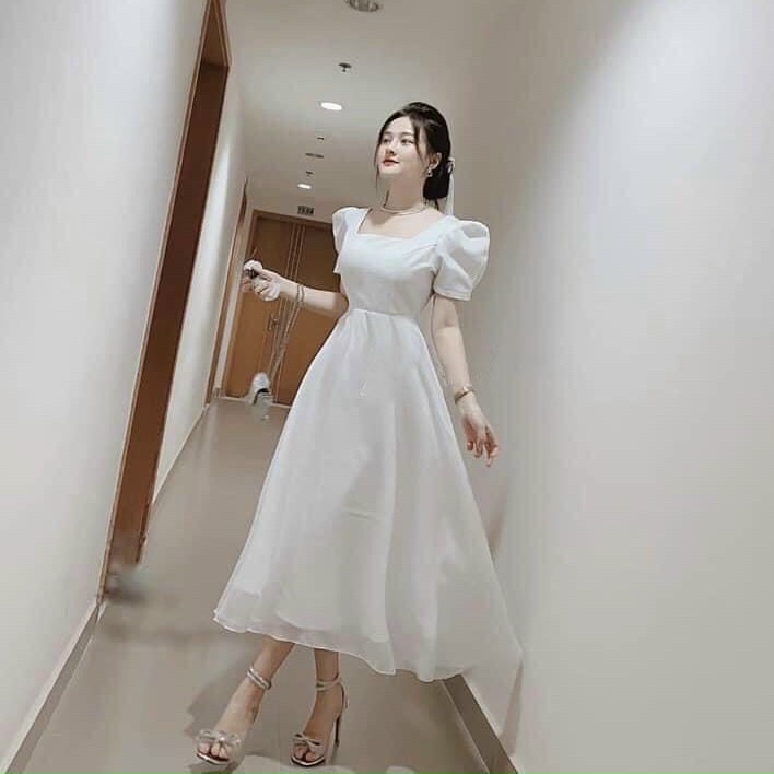 Đầm trắng form dài nơ sau
