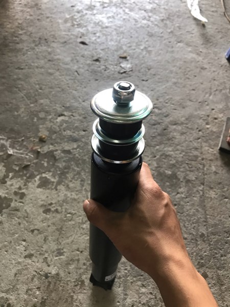Giảm Xóc Trước KIA 1T4 1 ốc 1 khuyên Vỏ Sắt DAEHAN