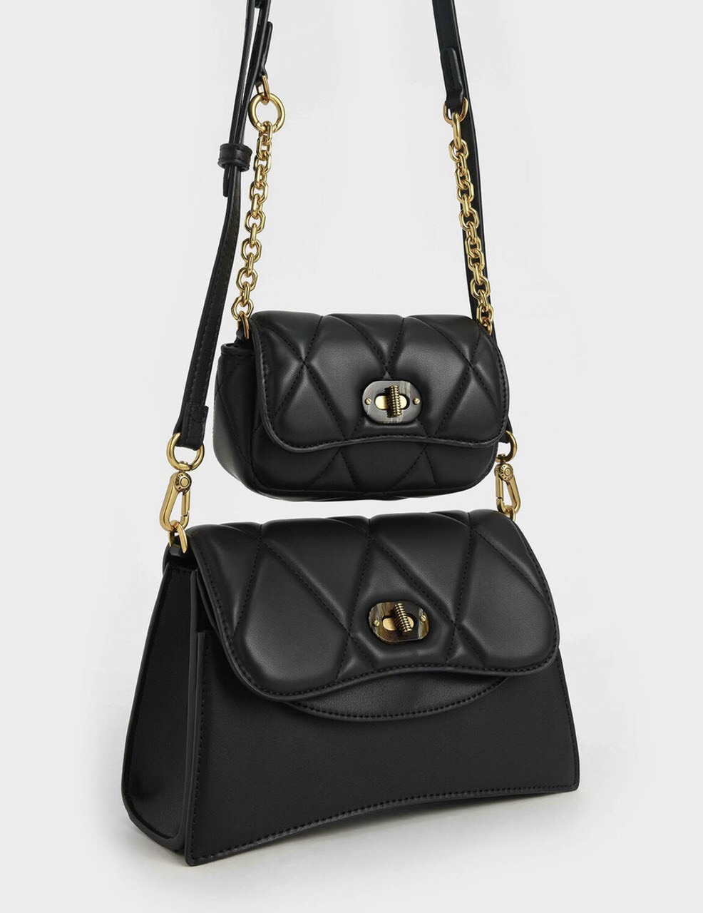 [COMBO SALE]TÚI ĐEO CHÉO NỮ CNK SIZE 22 VÀ TÚI CẦM TAY SIZE MÀU ĐEN SANG TRỌNG DA MỀM CHẦN CHỈ Ô TRÁM LỚN KHÓA XOAY DÂY ĐEO DÀI ĐIỀU CHỈNH ĐỘ DÀI NGẮN