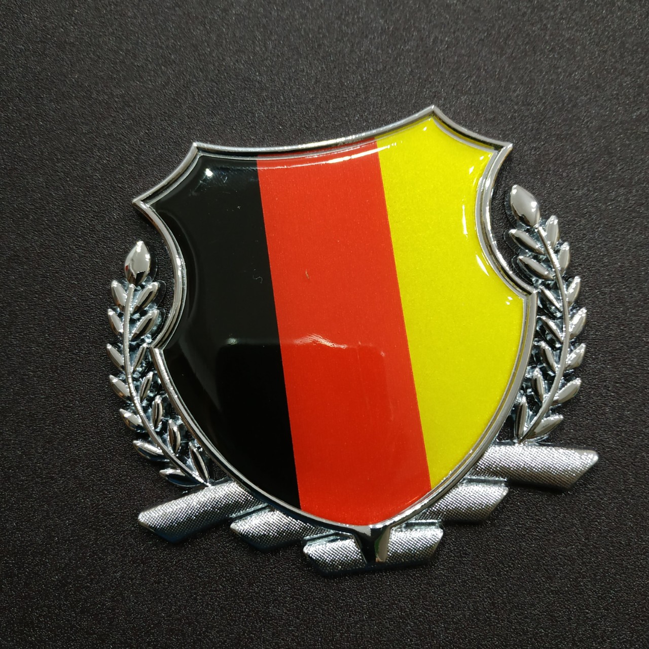 Logo bông lúa hợp kim kẽm 8x8.5cm hình cờ Đức viền Bạc